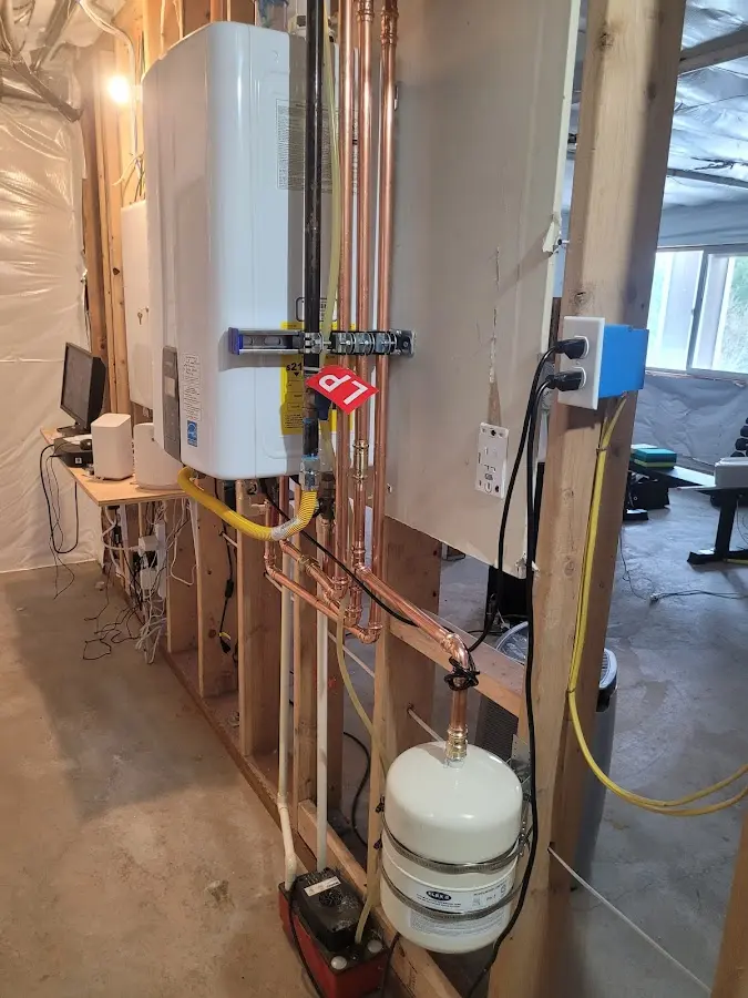 Licensed plumber repairing a kitchen sink in Moss Bluff